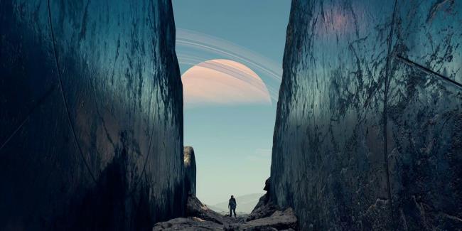 The player character standing in a crater in Starfield.